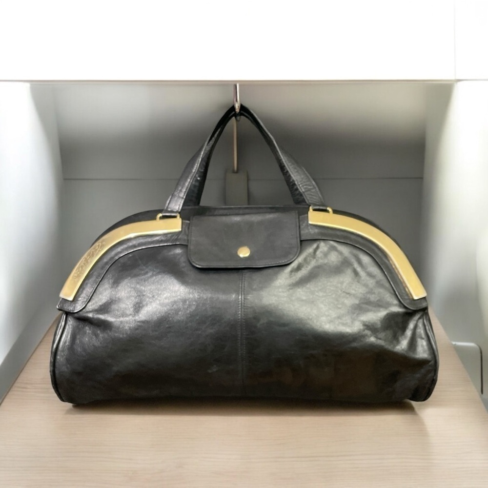 Vintage Pansy leather handbag with gold accents front pocket and zipper